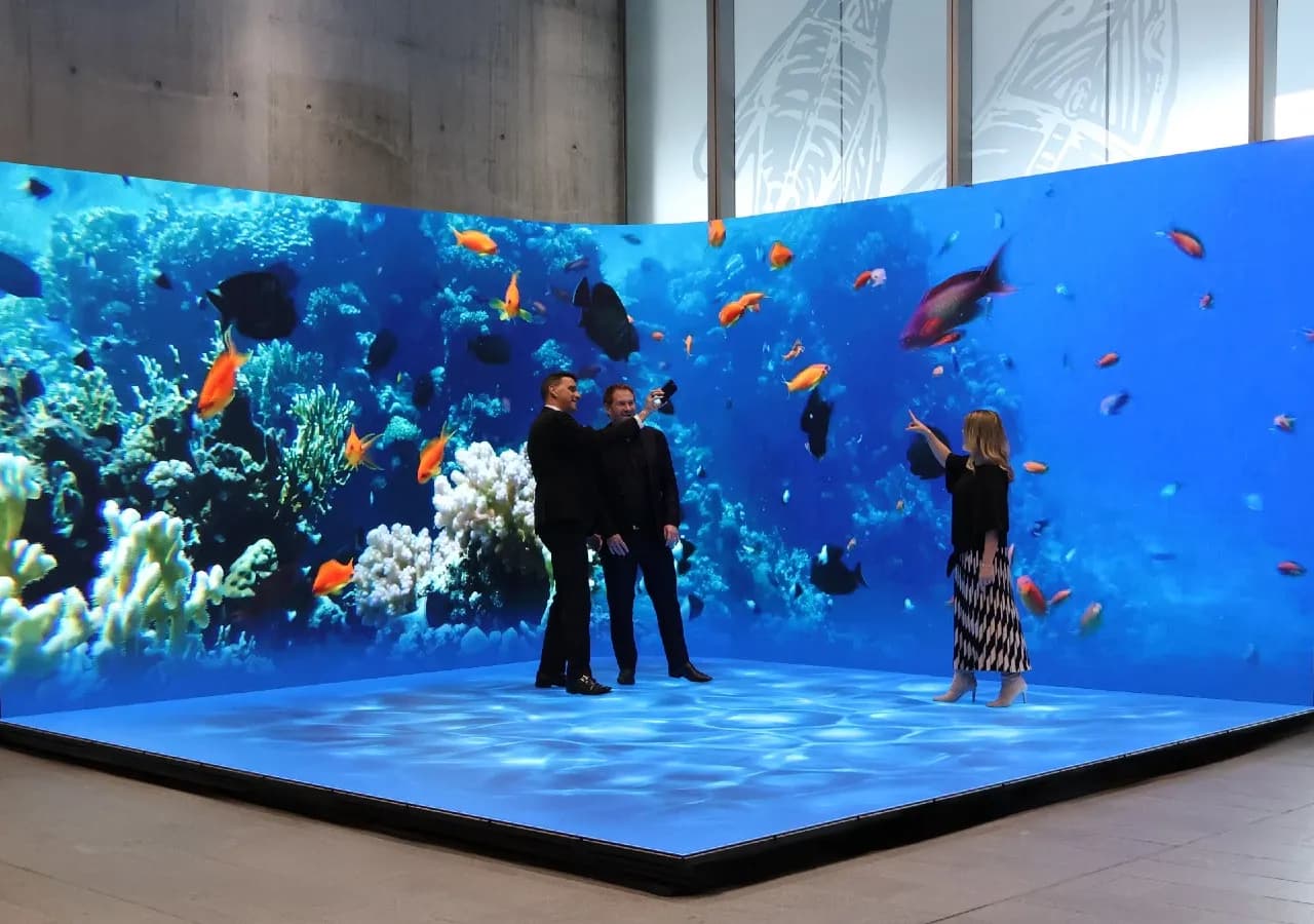 Guests inside an immersive corner LED brand activation display