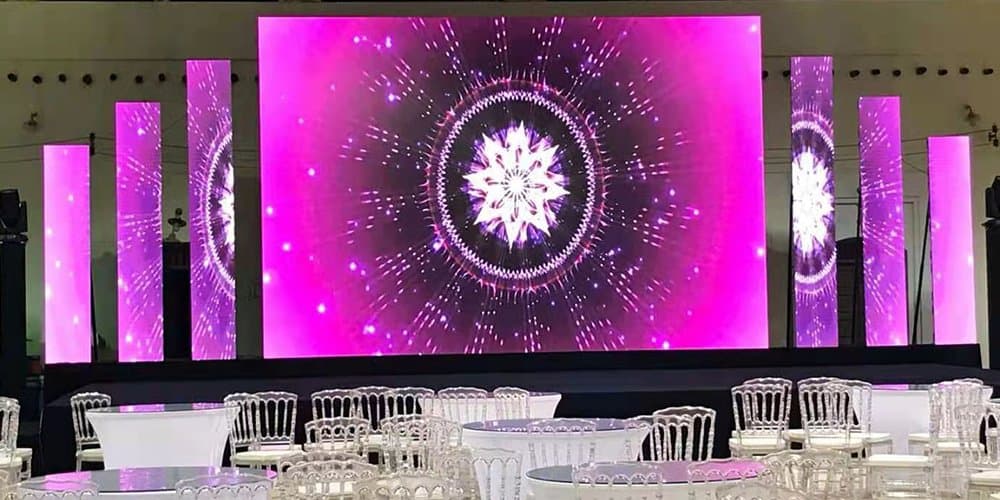 Elegant indoor corporate gala with a modular LED wall backdrop
